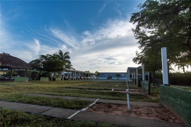 Under contract-accepting backup offers. Welcome to the friendly on Saint Andrews South Golf Club in Florida - for sale on GolfHomes.com, golf home, golf lot