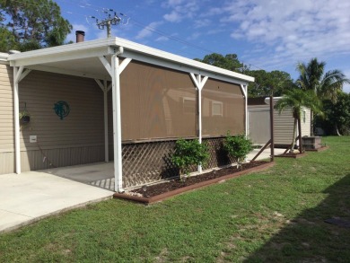 Move right into this beautifully updated home tucked back into a on Spanish Lakes I in Florida - for sale on GolfHomes.com, golf home, golf lot