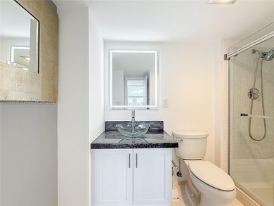 Enjoy unobstructed panoramic views of the Turnberry golf course on Turnberry Isle Resort and Club in Florida - for sale on GolfHomes.com, golf home, golf lot