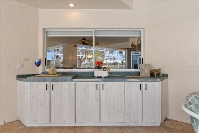 The ultimate Golfer's Sanctuary and Pool Home awaits! Perfectly on Tara Golf and Country Club in Florida - for sale on GolfHomes.com, golf home, golf lot