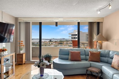 Lush tropical and water views await from this 12th floor condo on Pasadena Yacht and Country Club in Florida - for sale on GolfHomes.com, golf home, golf lot