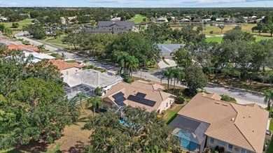 The ultimate Golfer's Sanctuary and Pool Home awaits! Perfectly on Tara Golf and Country Club in Florida - for sale on GolfHomes.com, golf home, golf lot