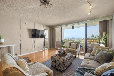 Lush tropical and water views await from this 12th floor condo on Pasadena Yacht and Country Club in Florida - for sale on GolfHomes.com, golf home, golf lot