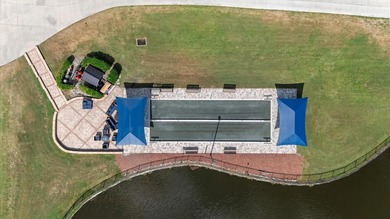 The ultimate Golfer's Sanctuary and Pool Home awaits! Perfectly on Tara Golf and Country Club in Florida - for sale on GolfHomes.com, golf home, golf lot