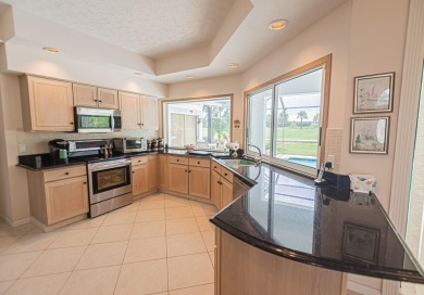 Welcome to this stunning 3/2/2 pool home nestled in sought after on St. Lucie Trail Golf Club in Florida - for sale on GolfHomes.com, golf home, golf lot
