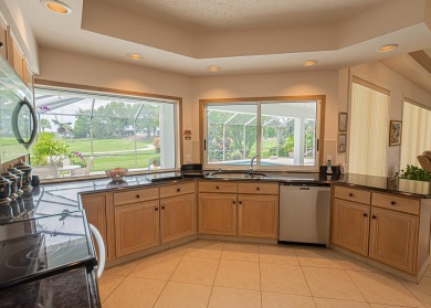 Welcome to this stunning 3/2/2 pool home nestled in sought after on St. Lucie Trail Golf Club in Florida - for sale on GolfHomes.com, golf home, golf lot