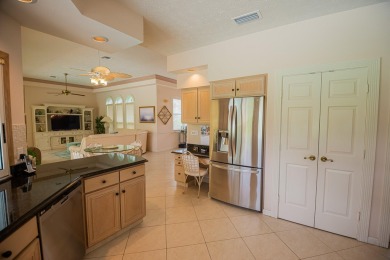 Welcome to this stunning 3/2/2 pool home nestled in sought after on St. Lucie Trail Golf Club in Florida - for sale on GolfHomes.com, golf home, golf lot