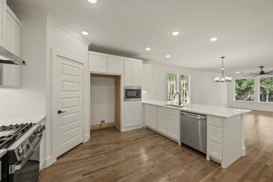 Discover the perfect blend of luxury and lifestyle with Our on The Golf Club at Resort Eagle Mountain Lake in Texas - for sale on GolfHomes.com, golf home, golf lot