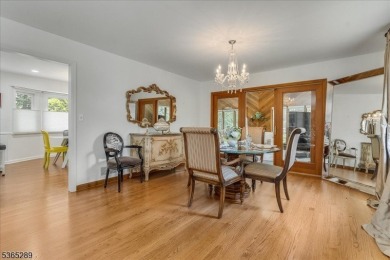 As you step inside, you're greeted by an inviting foyer that on Packanack Golf Club in New Jersey - for sale on GolfHomes.com, golf home, golf lot