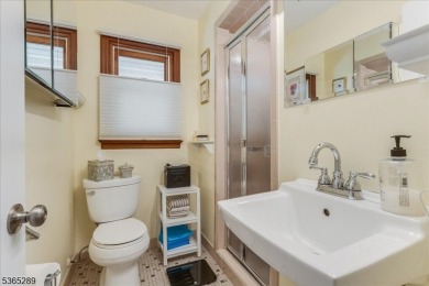 As you step inside, you're greeted by an inviting foyer that on Packanack Golf Club in New Jersey - for sale on GolfHomes.com, golf home, golf lot