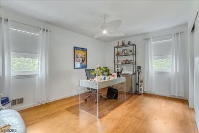 As you step inside, you're greeted by an inviting foyer that on Packanack Golf Club in New Jersey - for sale on GolfHomes.com, golf home, golf lot