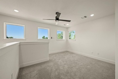 Discover the perfect blend of luxury and lifestyle with Our on The Golf Club at Resort Eagle Mountain Lake in Texas - for sale on GolfHomes.com, golf home, golf lot
