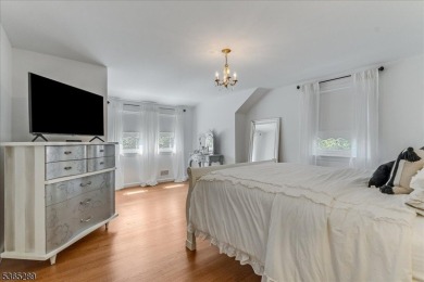 As you step inside, you're greeted by an inviting foyer that on Packanack Golf Club in New Jersey - for sale on GolfHomes.com, golf home, golf lot