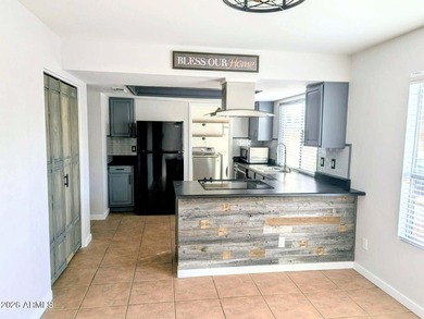 Honey stop the car-this is your new home! Beautiful 3/2 with on Bellaire Golf Club in Arizona - for sale on GolfHomes.com, golf home, golf lot