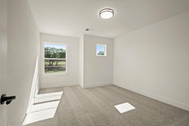 Discover the perfect blend of luxury and lifestyle with Our on The Golf Club at Resort Eagle Mountain Lake in Texas - for sale on GolfHomes.com, golf home, golf lot