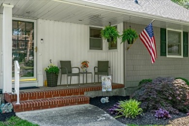 As you step inside, you're greeted by an inviting foyer that on Packanack Golf Club in New Jersey - for sale on GolfHomes.com, golf home, golf lot