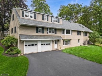 As you step inside, you're greeted by an inviting foyer that on Packanack Golf Club in New Jersey - for sale on GolfHomes.com, golf home, golf lot