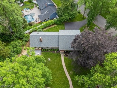 As you step inside, you're greeted by an inviting foyer that on Packanack Golf Club in New Jersey - for sale on GolfHomes.com, golf home, golf lot