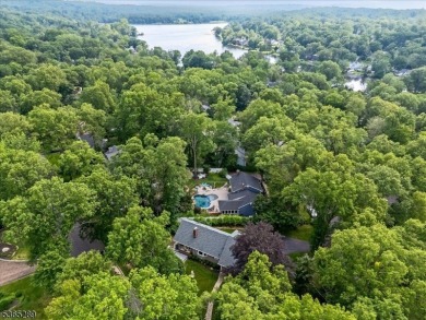 As you step inside, you're greeted by an inviting foyer that on Packanack Golf Club in New Jersey - for sale on GolfHomes.com, golf home, golf lot