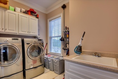 Experience luxury living in the heart of Woodside Plantation on The Reserve Club At Woodside Plantation in South Carolina - for sale on GolfHomes.com, golf home, golf lot