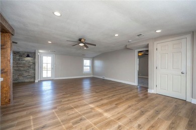 This home is the perfect blend of comfort, charm, function, and on Linn Valley Lakes - Deer Trace Golf Course in Kansas - for sale on GolfHomes.com, golf home, golf lot