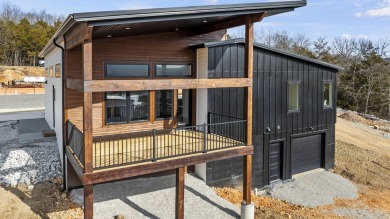 This brand new home is just a short easy walk to the community's on Kimberling City Golf Club in Missouri - for sale on GolfHomes.com, golf home, golf lot