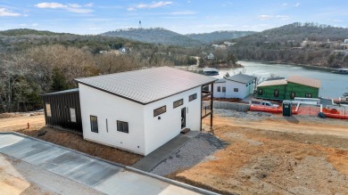 This brand new home is just a short easy walk to the community's on Kimberling City Golf Club in Missouri - for sale on GolfHomes.com, golf home, golf lot