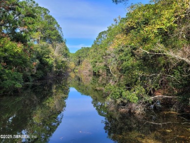 This is a one of a kind lot, and a truly rare opportunity to own on The Grand Club - Pine Lakes Course in Florida - for sale on GolfHomes.com, golf home, golf lot