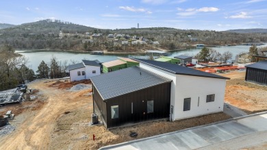 This brand new home is just a short easy walk to the community's on Kimberling City Golf Club in Missouri - for sale on GolfHomes.com, golf home, golf lot