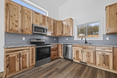 This brand new home is just a short easy walk to the community's on Kimberling City Golf Club in Missouri - for sale on GolfHomes.com, golf home, golf lot