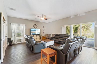 Welcome to this stunning 4-bedroom, 3-bathroom pool home in the on North Shore Golf Club in Florida - for sale on GolfHomes.com, golf home, golf lot