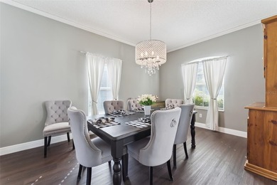 Welcome to this stunning 4-bedroom, 3-bathroom pool home in the on North Shore Golf Club in Florida - for sale on GolfHomes.com, golf home, golf lot