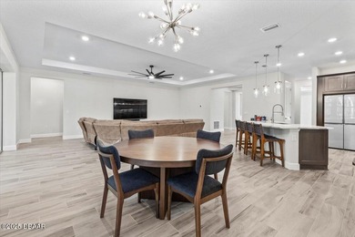 Experience luxury living in the gated Windchase section of on Halifax Plantation Golf Club in Florida - for sale on GolfHomes.com, golf home, golf lot