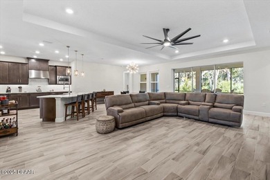 Experience luxury living in the gated Windchase section of on Halifax Plantation Golf Club in Florida - for sale on GolfHomes.com, golf home, golf lot