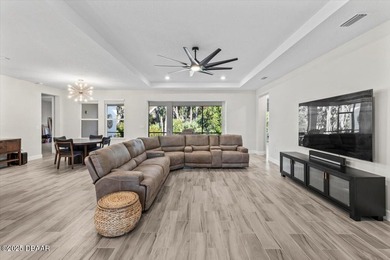 Experience luxury living in the gated Windchase section of on Halifax Plantation Golf Club in Florida - for sale on GolfHomes.com, golf home, golf lot