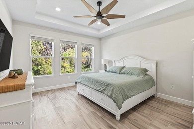 Experience luxury living in the gated Windchase section of on Halifax Plantation Golf Club in Florida - for sale on GolfHomes.com, golf home, golf lot