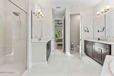 Experience luxury living in the gated Windchase section of on Halifax Plantation Golf Club in Florida - for sale on GolfHomes.com, golf home, golf lot