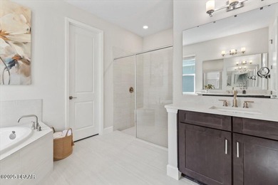 Experience luxury living in the gated Windchase section of on Halifax Plantation Golf Club in Florida - for sale on GolfHomes.com, golf home, golf lot