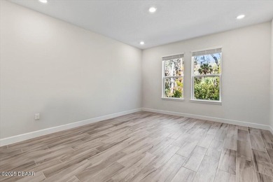 Experience luxury living in the gated Windchase section of on Halifax Plantation Golf Club in Florida - for sale on GolfHomes.com, golf home, golf lot