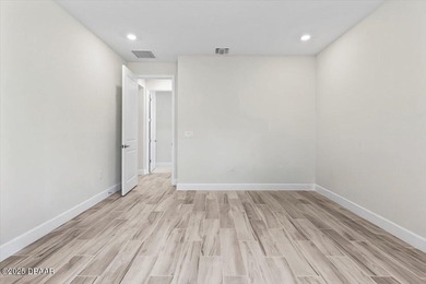 Experience luxury living in the gated Windchase section of on Halifax Plantation Golf Club in Florida - for sale on GolfHomes.com, golf home, golf lot