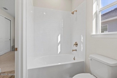 Experience luxury living in the gated Windchase section of on Halifax Plantation Golf Club in Florida - for sale on GolfHomes.com, golf home, golf lot