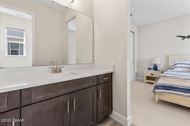 Experience luxury living in the gated Windchase section of on Halifax Plantation Golf Club in Florida - for sale on GolfHomes.com, golf home, golf lot