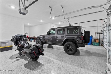 Experience luxury living in the gated Windchase section of on Halifax Plantation Golf Club in Florida - for sale on GolfHomes.com, golf home, golf lot