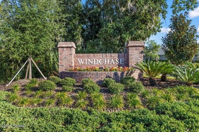 Experience luxury living in the gated Windchase section of on Halifax Plantation Golf Club in Florida - for sale on GolfHomes.com, golf home, golf lot