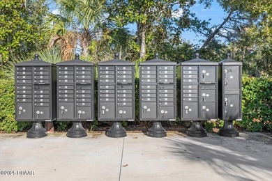 Experience luxury living in the gated Windchase section of on Halifax Plantation Golf Club in Florida - for sale on GolfHomes.com, golf home, golf lot