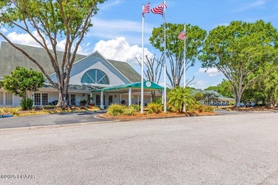 Experience luxury living in the gated Windchase section of on Halifax Plantation Golf Club in Florida - for sale on GolfHomes.com, golf home, golf lot