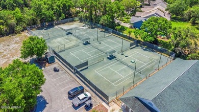 Experience luxury living in the gated Windchase section of on Halifax Plantation Golf Club in Florida - for sale on GolfHomes.com, golf home, golf lot