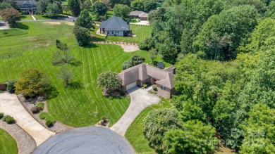 Nestled in the foothills of North Carolina, 2705 Lyle Court NE on Rock Barn Golf and Spa in North Carolina - for sale on GolfHomes.com, golf home, golf lot