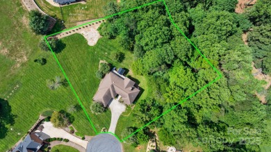 Nestled in the foothills of North Carolina, 2705 Lyle Court NE on Rock Barn Golf and Spa in North Carolina - for sale on GolfHomes.com, golf home, golf lot