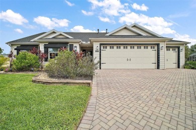 BOND PAID! STUNNING 3 BED / 2 BATH DESIGNER HOME WITH SALTWATER on The Links of Spruce Creek in Florida - for sale on GolfHomes.com, golf home, golf lot